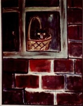 Le chat dans la corbeille
